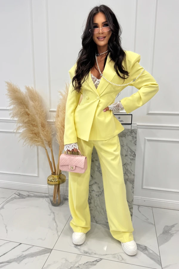 Żółta marynarka zapinana na guzik z poduszkami na ramionach i wiązaniem NESTI 17