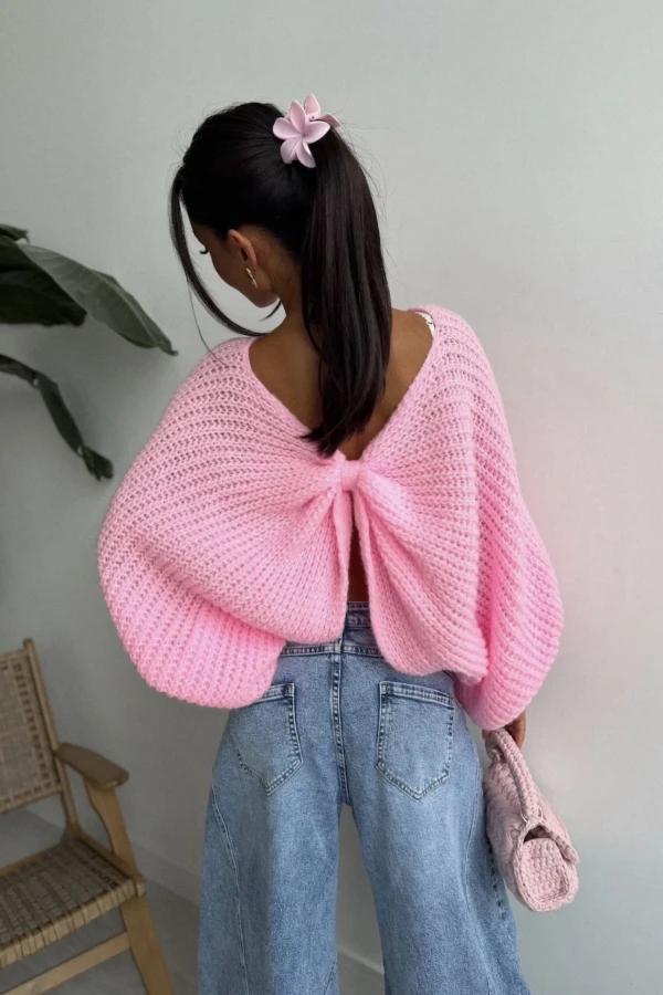 Różowy sweter pleciony z supełkiem na plecach 95% bawełny Fines